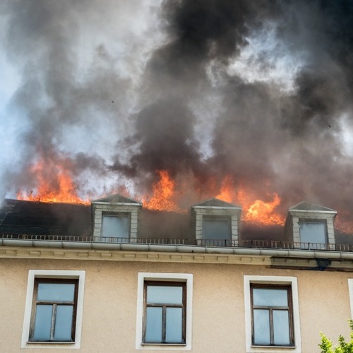 roof of a house in flames