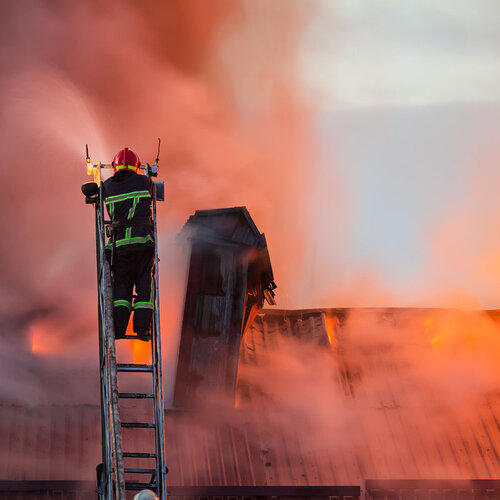 firefighters putting out a house fire